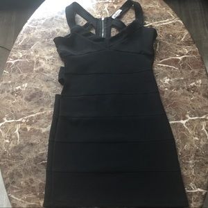 Fitted black dress with back cut out